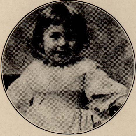 Child in a white dress.
