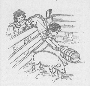 boy bent over a fence with girl holding his feet, trying to reach a pail