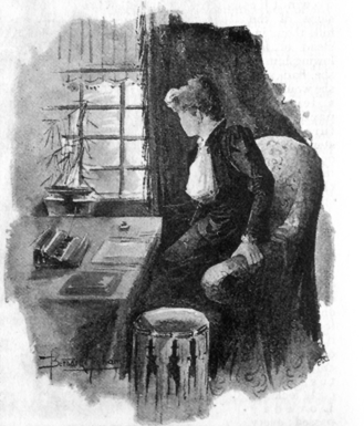 Image of a woman in dark dress (Loveday Brooke) turning to look out a window, while seated at a table.