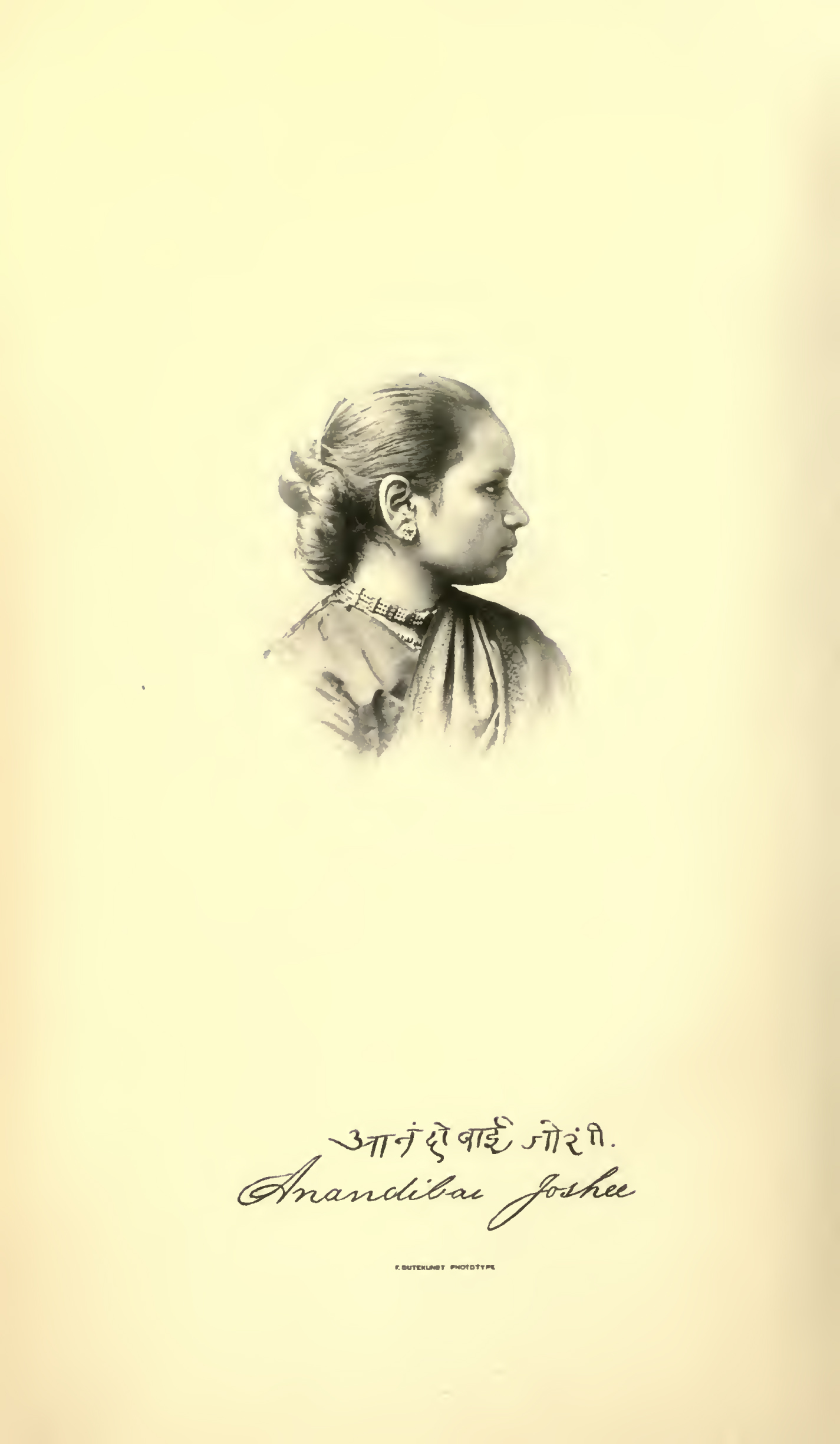 portrait of woman in sari with hair pulled back