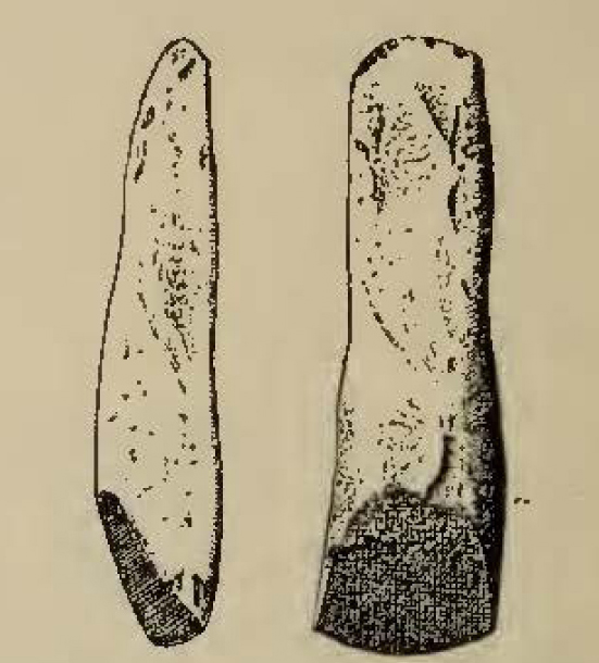 two carved stone tools