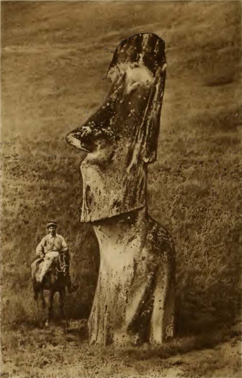 Humorous moai sculpture with pilot helmet