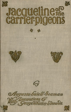 Cloth cover of book with decorative flourishes.
