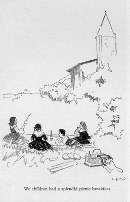 Children relaxing outside, eating.