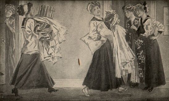 two students carrying pillows and clothing as two other women look on