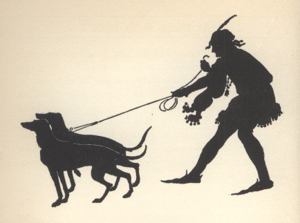 The silhouette of a man holding two dogs on a leash.