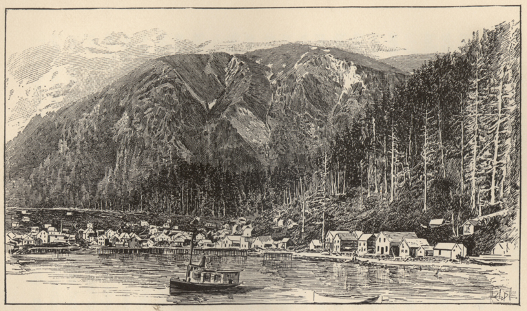 town built by water and mountains, boats in harbor